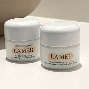Two empty La Mer moisturizer containers 0.5 oz each